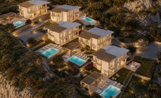 Συγκρότημα τεσσάρων πολυτελών βιλών στα Μάλια Κρήτης με ιδιωτικές πισίνες, πανοραμική θέα στο Κρητικό Πέλαγος και σύγχρονο μεσογειακό σχεδιασμό από τη Γραμμική α.
