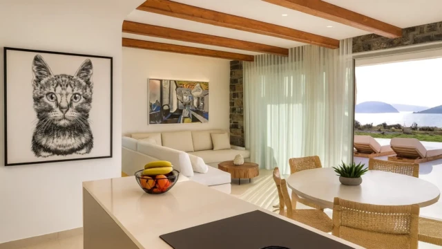 Open-plan living room and kitchen with sea view in Crete Open-plan living room and kitchen in a luxury holiday villa in Crete overlooking the sea