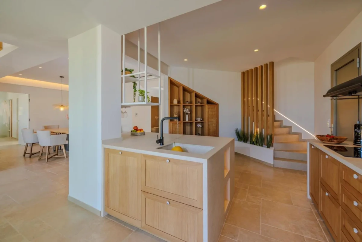 Luxury Villa in Malia, Crete by Grammiki a with open plan kitchen design