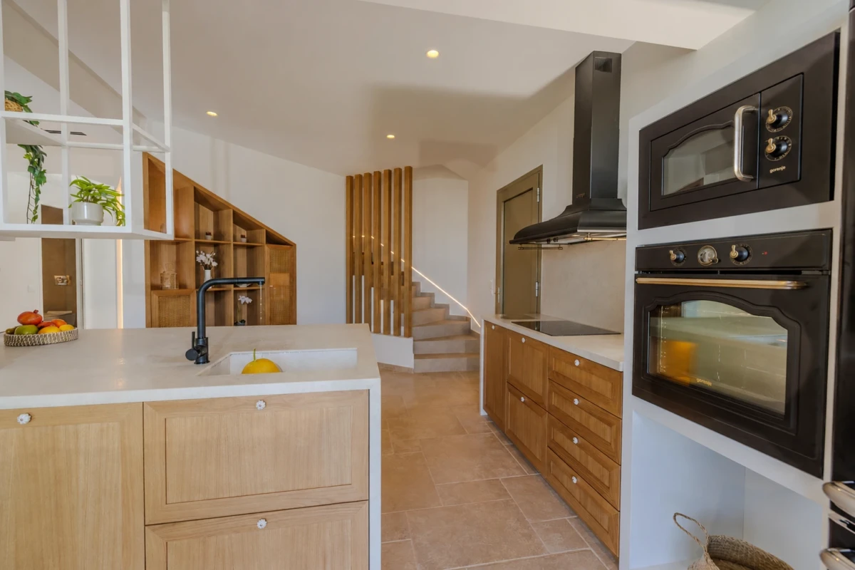 Luxury Villa in Malia, Crete by Grammiki a featuring a bespoke kitchen