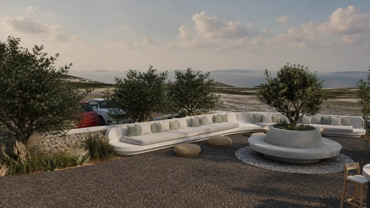 Υπαίθριο lounge καθιστικό σε wedding venue στη Σαντορίνη με κυκλικά καθιστικά, ελιές και θέα προς την Καλντέρα